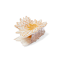 Hair clip in the shape of an white waterlily - side view.